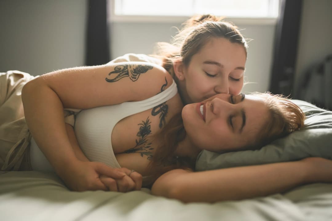 A,Happy,Couple,Cuddling,On,Their,Bed,At,Home.,Romantic