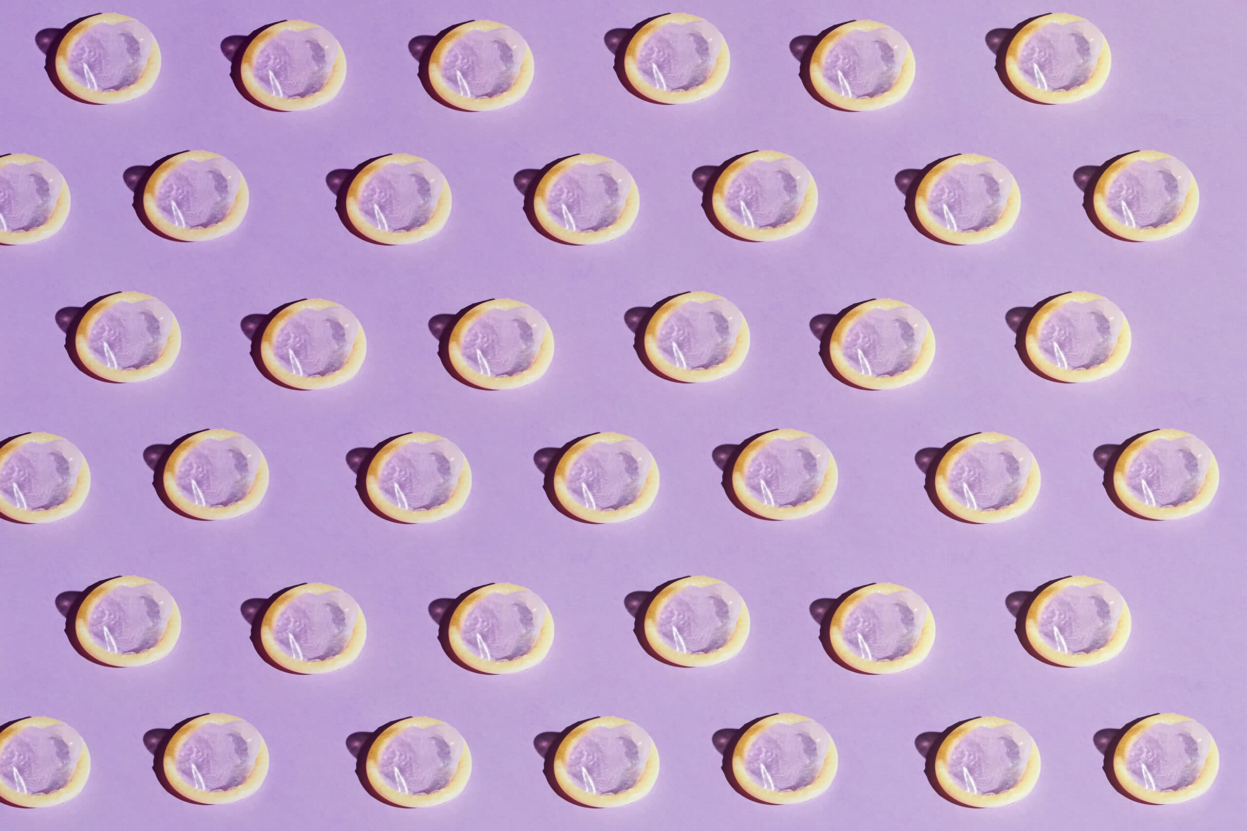 Many,Condoms,Isolated,On,The,Blue,Background,collection,,Composition,Of,Condoms,