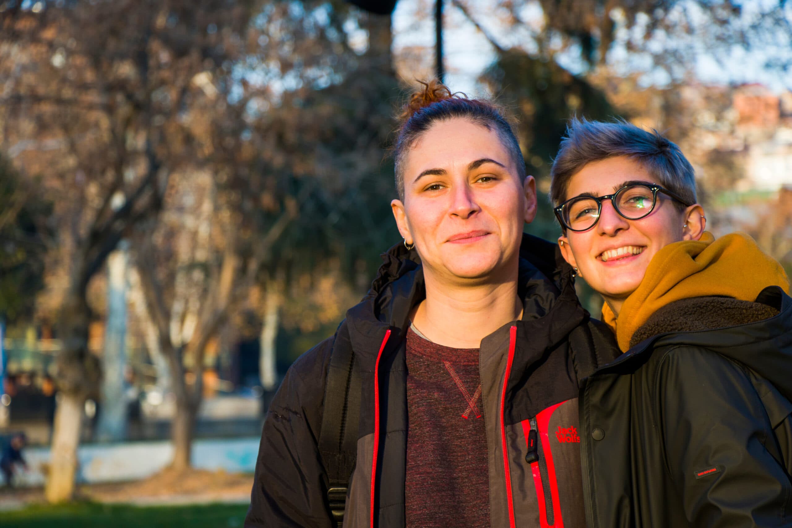 Gay,Lesbian,Couple,Portrait,,Two,Adult,Woman,In,The,Park,