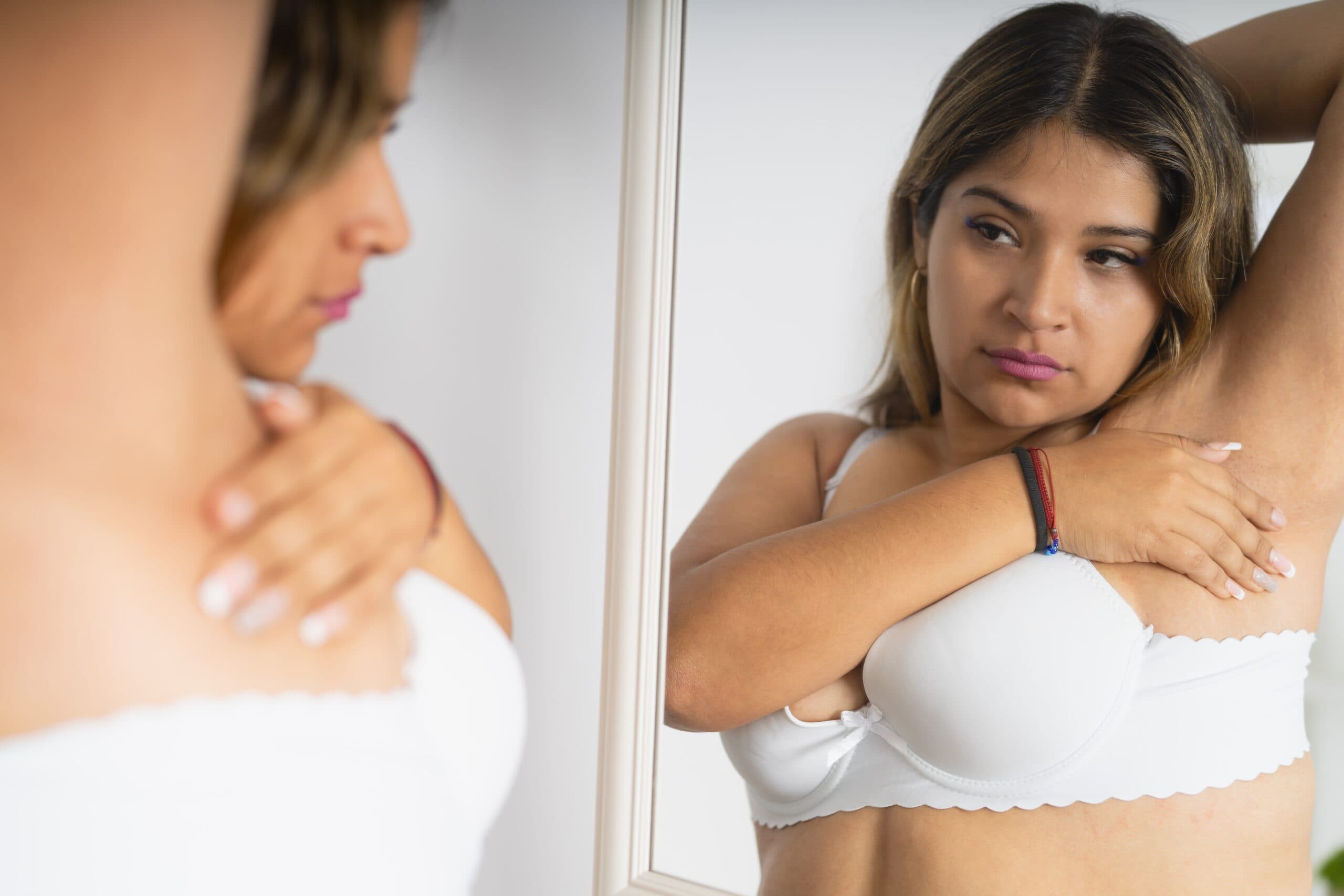 Reflection,In,The,Mirror,Of,A,Latin,Woman,Doing,Self