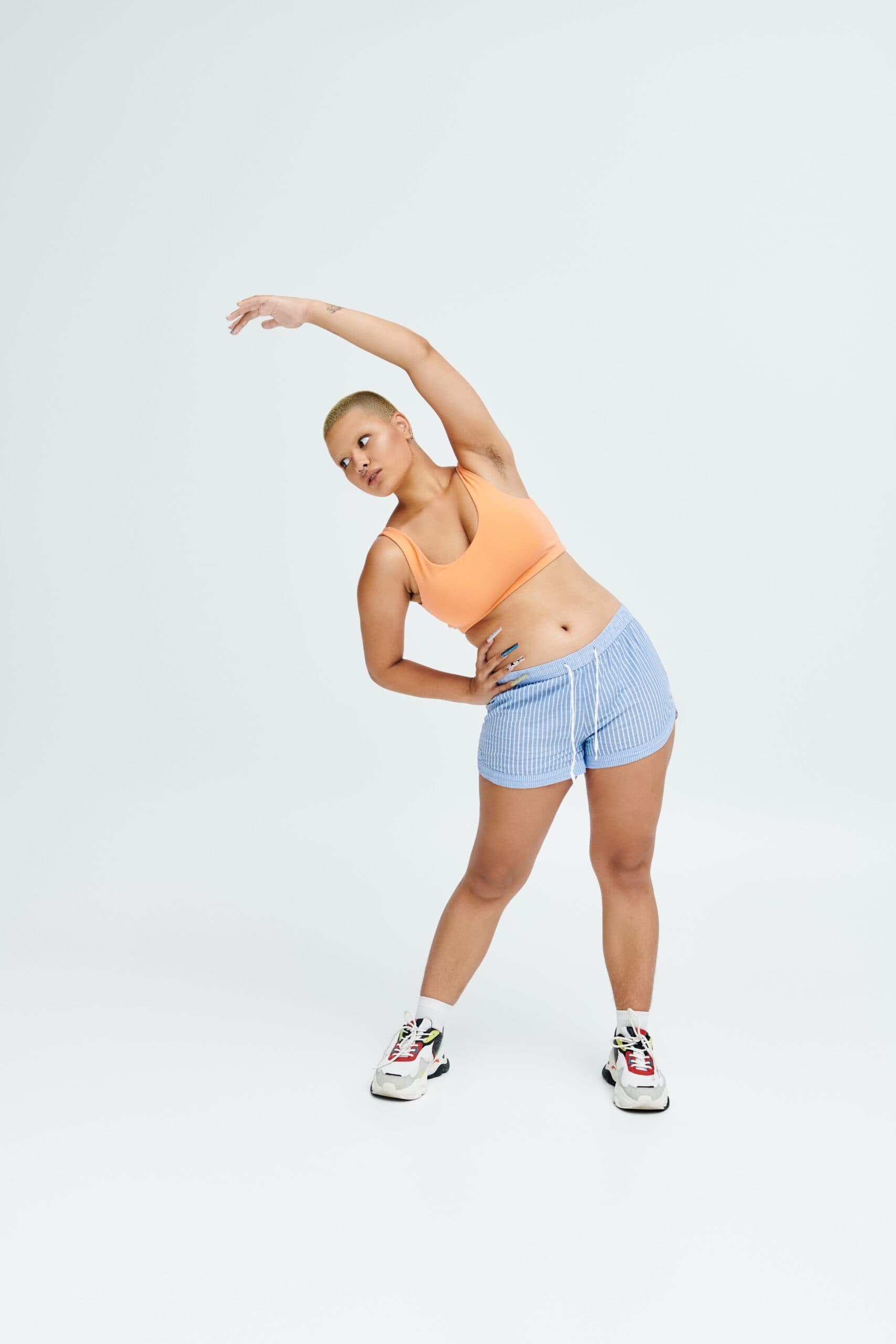 A,Bold,Young,Woman,In,Bright,Attire,Performs,A,Side